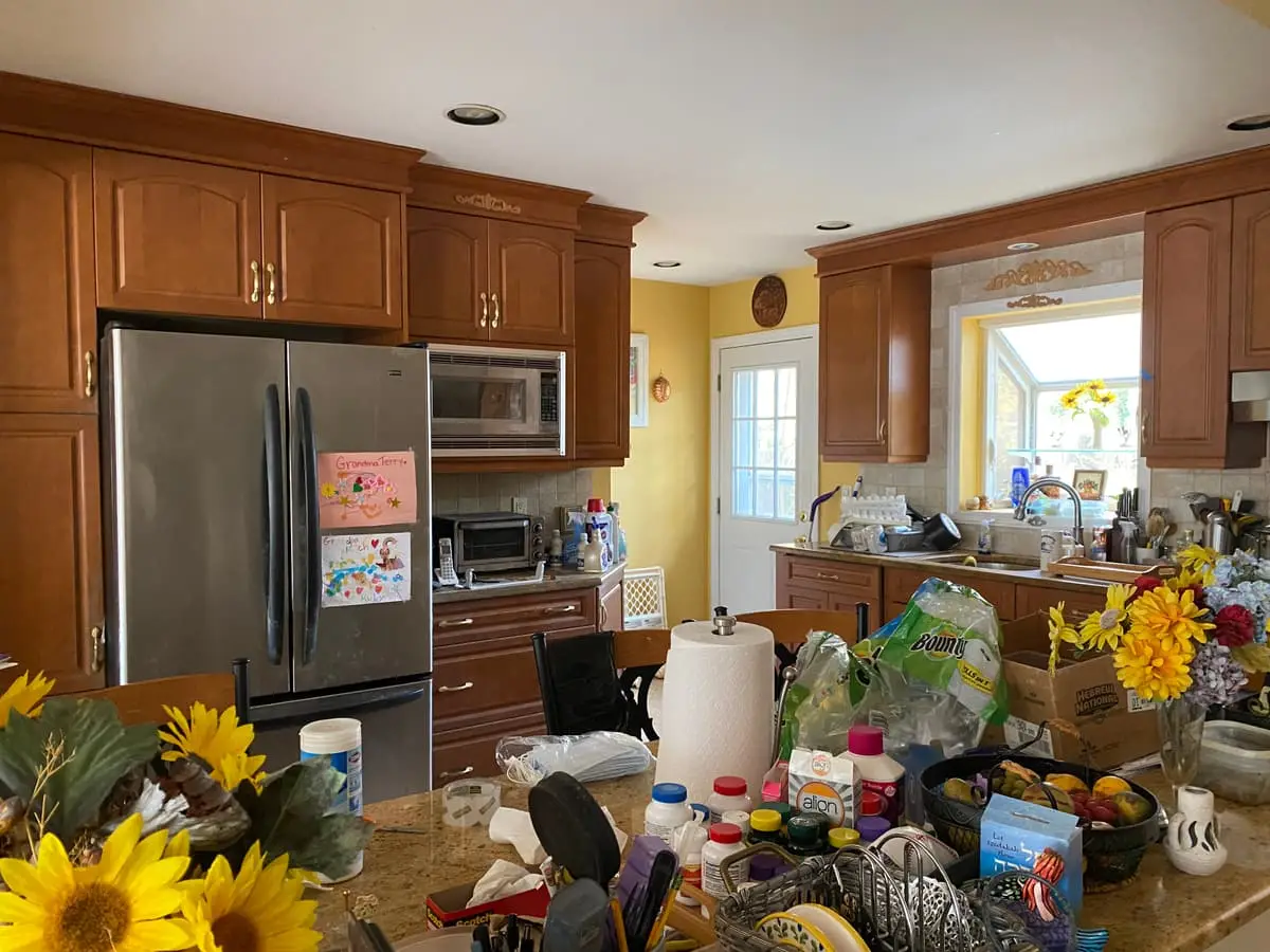Selling a house during a divorce in Northport: kitchen counters crowded with groceries and bottles